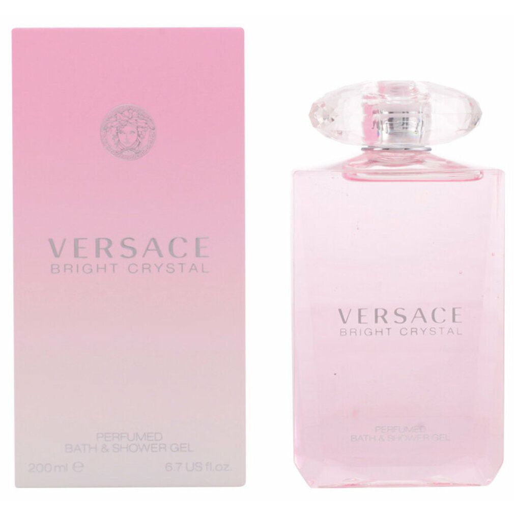 Flacon et emballage de gel douche rose. Inscription : Versace Bright Crystal. Bain & gel douche parfumé.