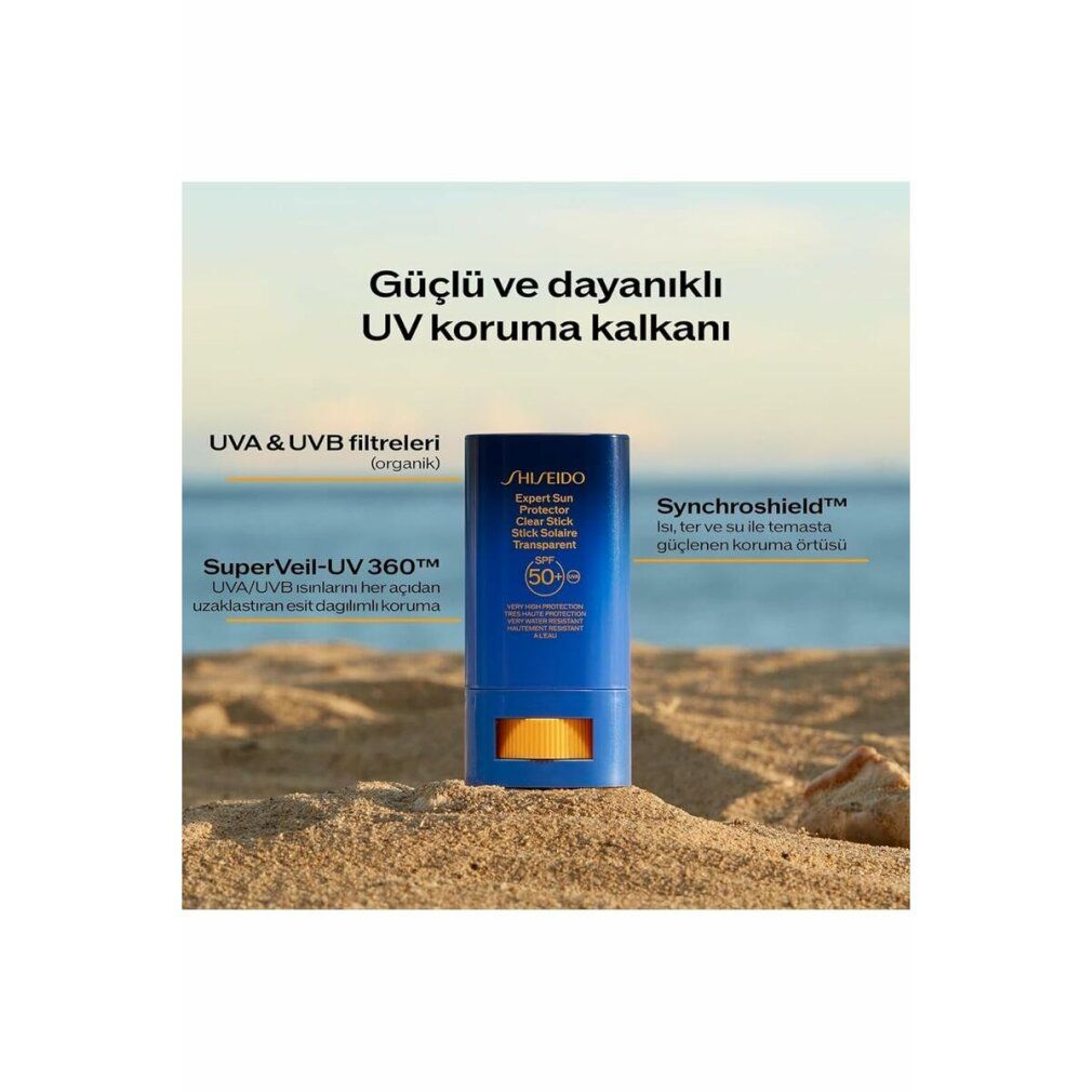 Image produit sur sable. Shiseido Sun Expert Stick Solare SPF50. Texte: Güçlü ve dayanıklı UV koruma kalkanı.