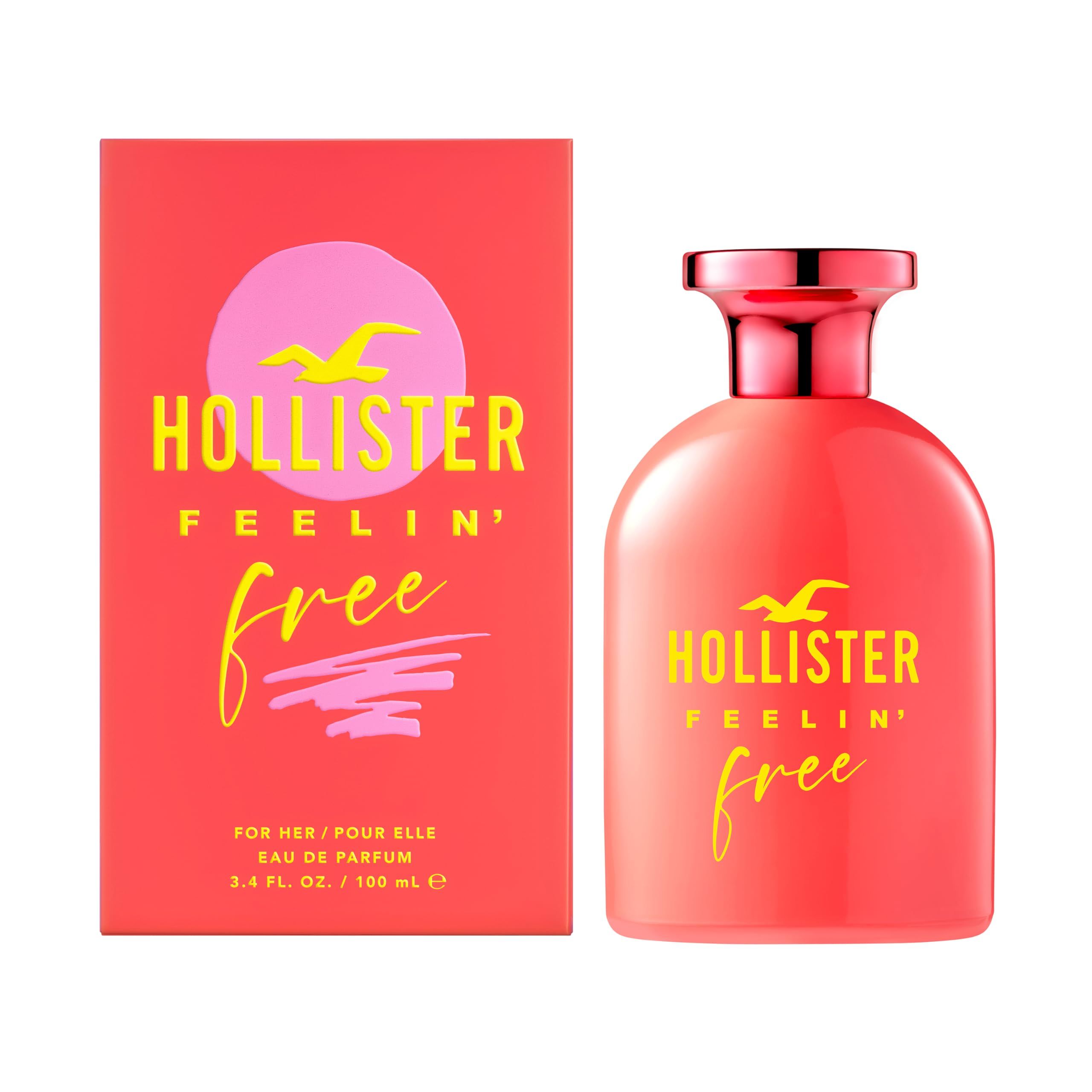 Rode fles en verpakking. Opschrift: Hollister Feelin' Free. Gele tekst. Roze achtergrond.