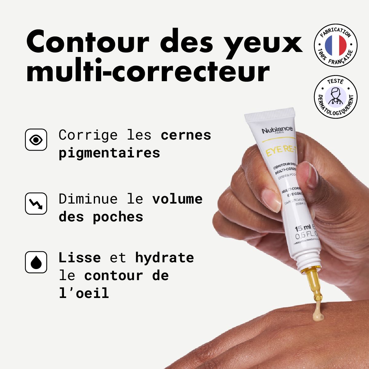 Correctiecrème in tube. Opschrift: Nubiance, EYE RE-7, Contour des yeux multi-correcteur, 15 ml. Hand houdt tube vast.