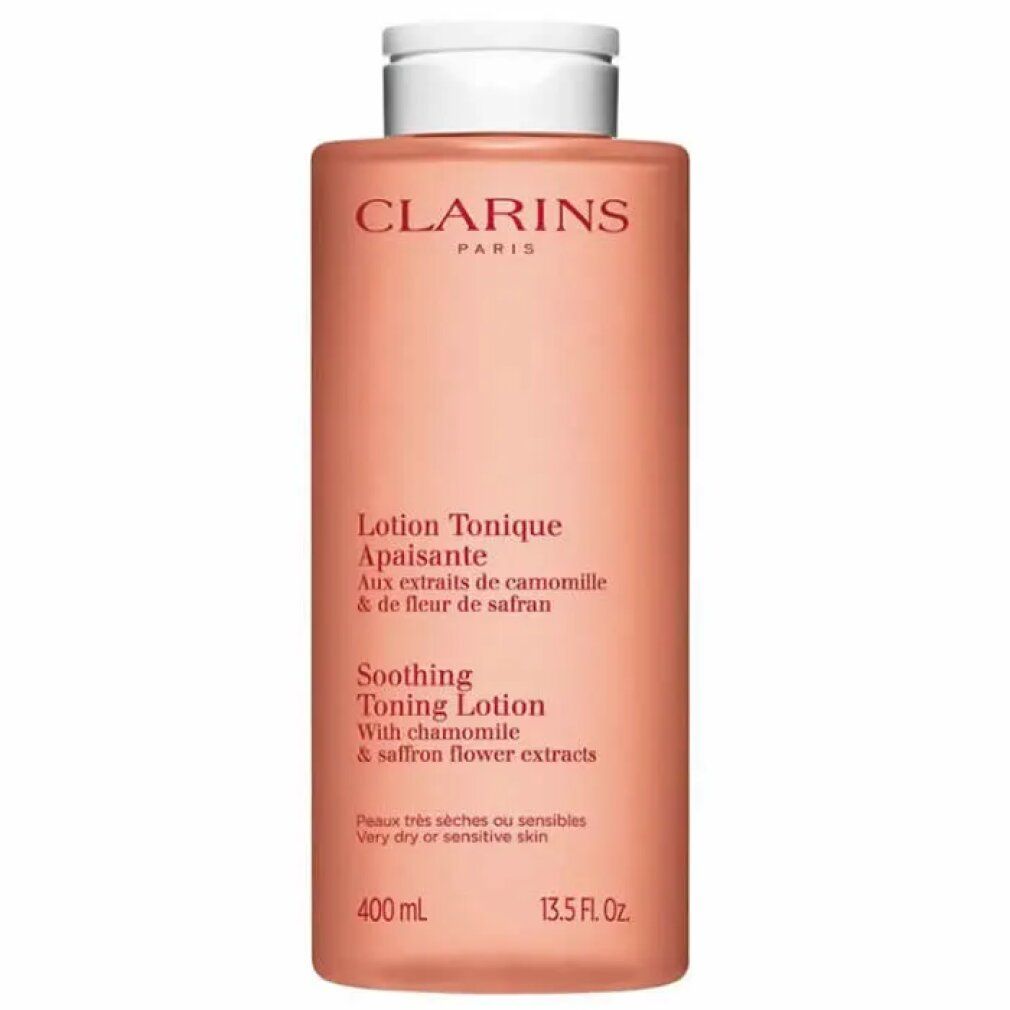 Roze fles met witte dop. Opschrift: CLARINS PARIS. Tekst: Lotion Tonique Apaisante. Met kamille & saffloerbloemextracten. 400 ml.