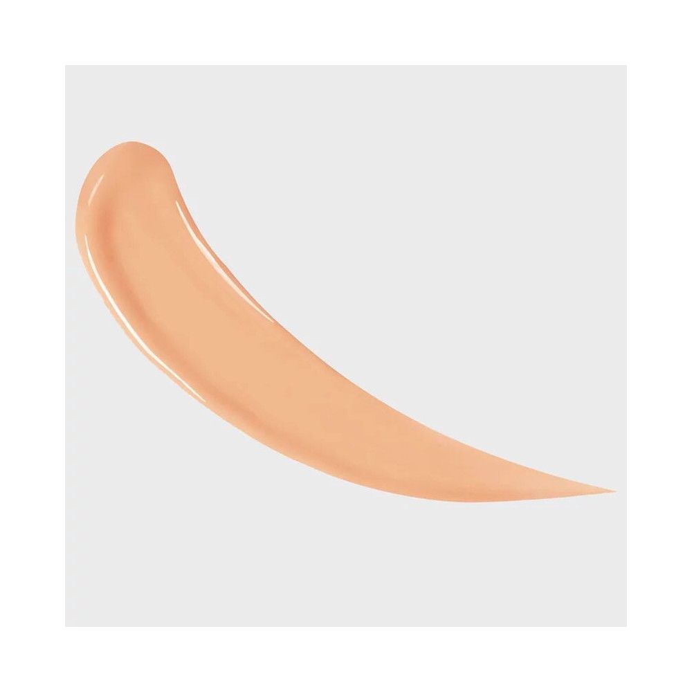 Lichte concealerstreep op lichte achtergrond. Kleurtint.