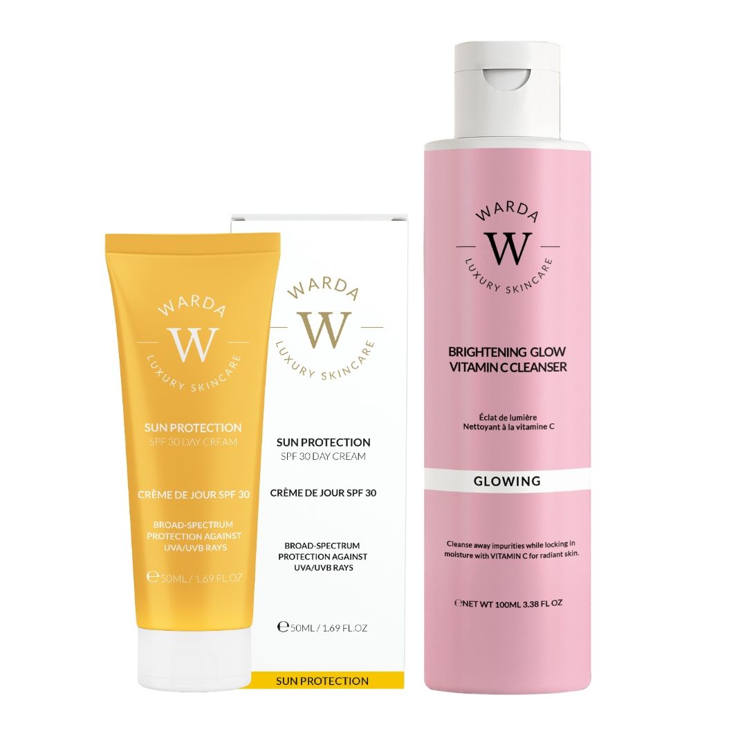 Tube jaune, boîte blanche et flacon rose. Inscription : Warda Luxury Skincare, Vitamin C Cleanser, SPF 30 Day Cream.