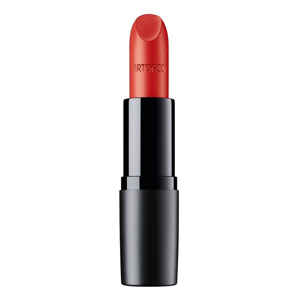 Rouge à lèvres orangé, logo ARTDECO. Support noir cylindrique. Pointe du rouge à lèvres arrondie.