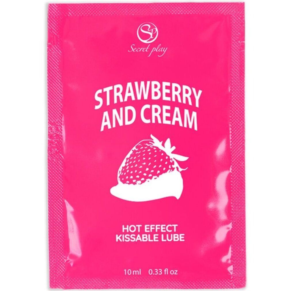Klein roze sachet met 'Strawberry and Cream' opdruk, aardbei en 'Hot Effect Kissable Lube'. 10ml.