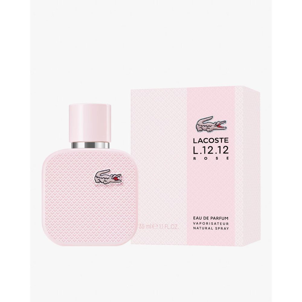 Flacon et boîte Lacoste L.12.12 Rose EdP Nat. Spray roses. Logo crocodile. Texte: Eau de Parfum, Natural Spray.