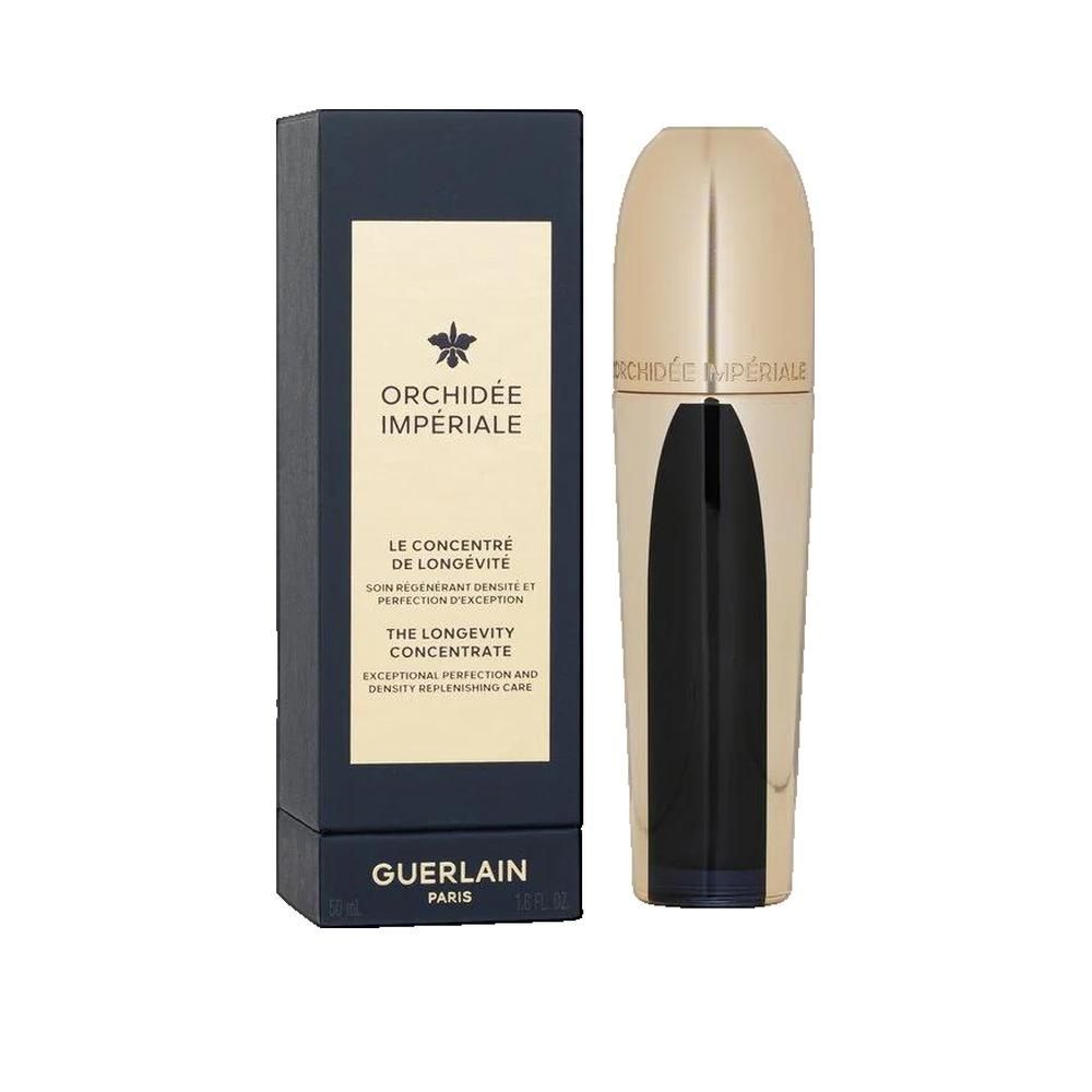 Gouden fles naast een donkerblauwe doos. Opschrift: ORCHIDÉE IMPÉRIALE, GUERLAIN.