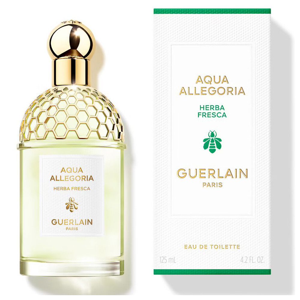 Guerlain Aqua Allegoria Herba Fresca Eau de Toilette fles en verpakking. Fles met gouden dop en honingraat ontwerp. Tekst: Aqua Allegoria, Herba Fresca.