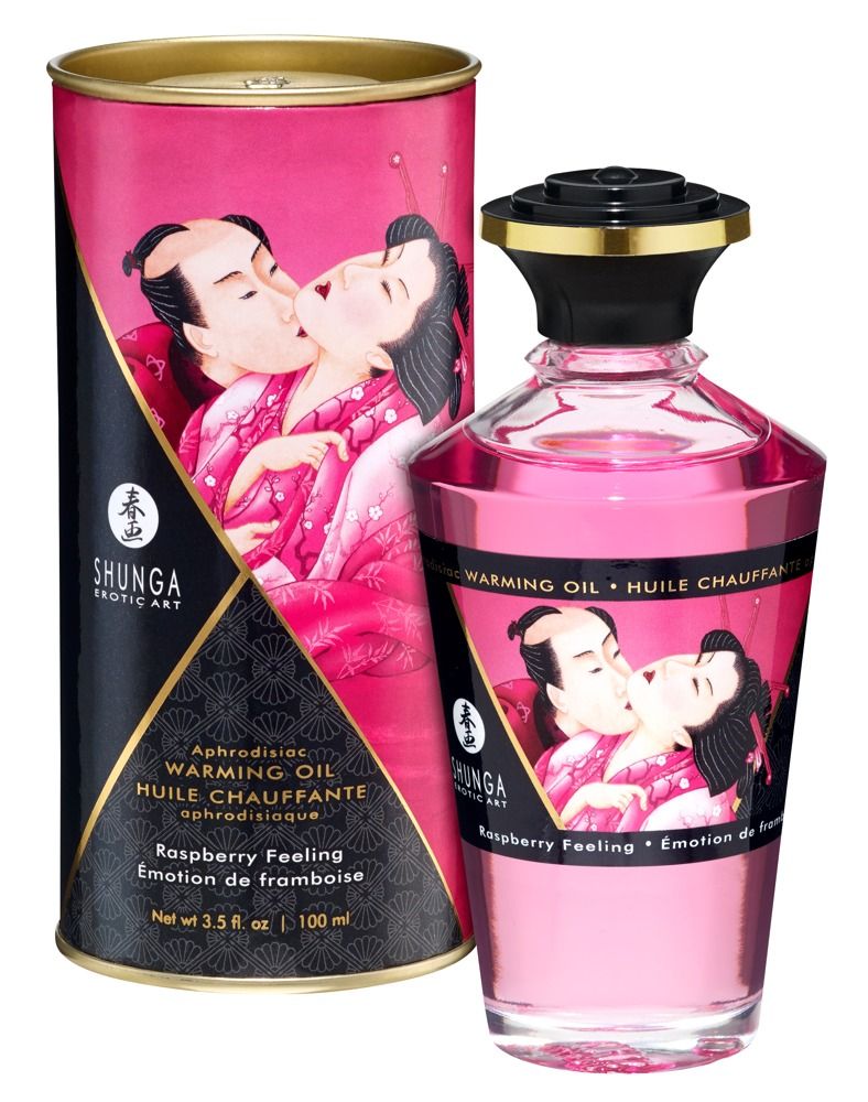 Massageolie fles en doos. Afdruk van een kussend paar. Tekst: Shunga, Warming Oil, Raspberry Feeling. Roze vloeistof.