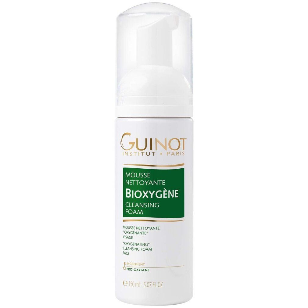 Wit flesje met sproeikop. Opschrift: Guinot, Mousse Nettoyante Bioxygene, Cleansing Foam. Groene en gouden accenten.