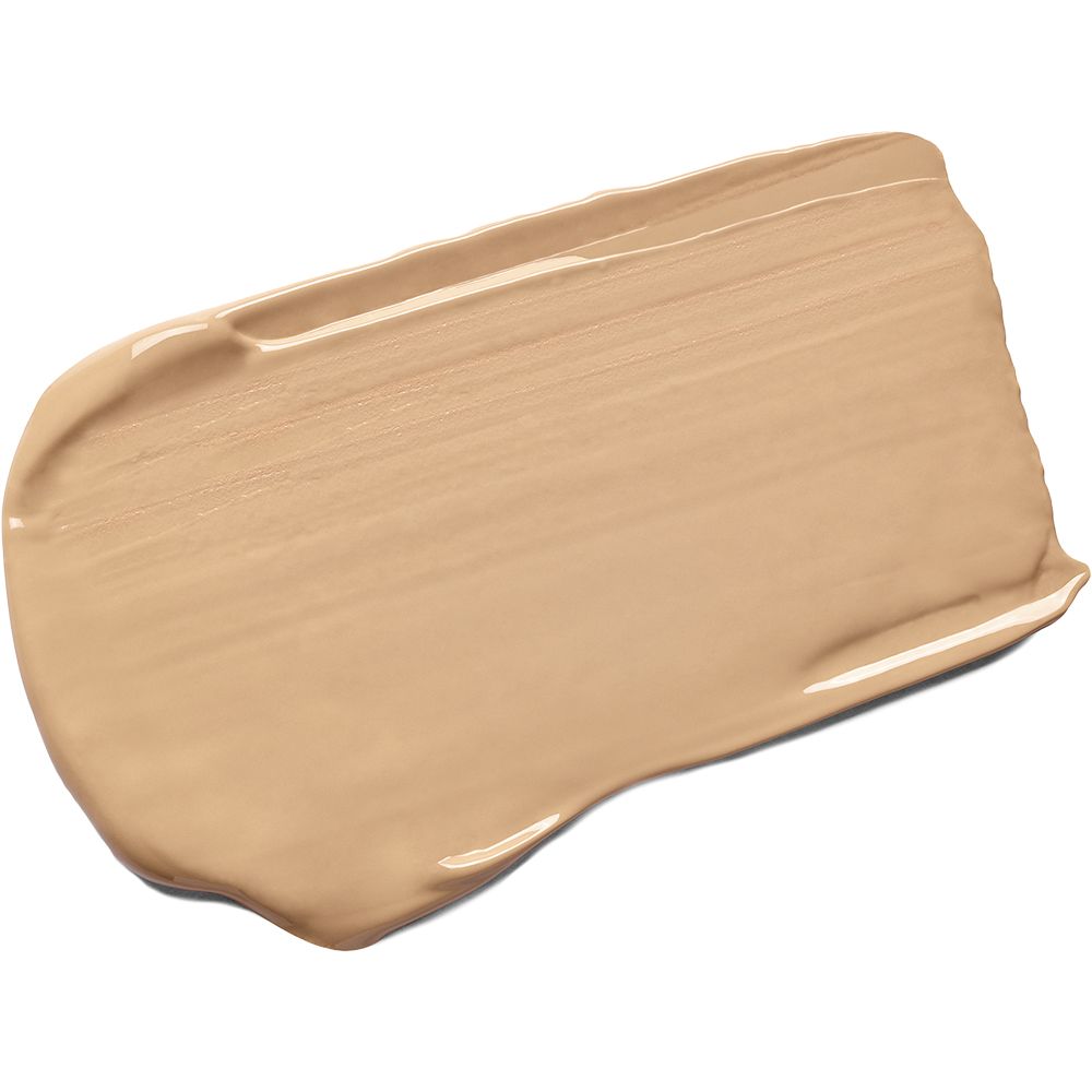 Uitgesmeerde BB-crème. Lichtbeige kleur. Glanzende textuur. Op witte achtergrond.