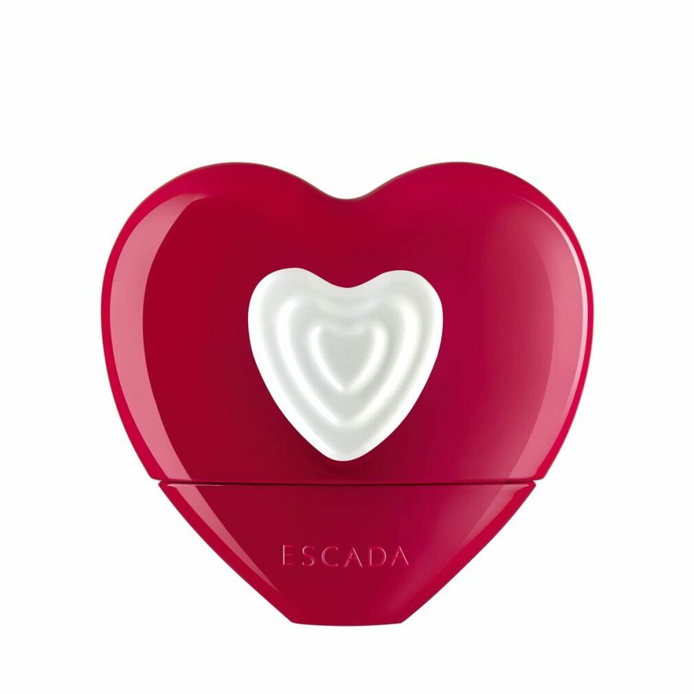 Flacon rouge en forme de cœur avec cœur blanc. Texte : ESCADA.