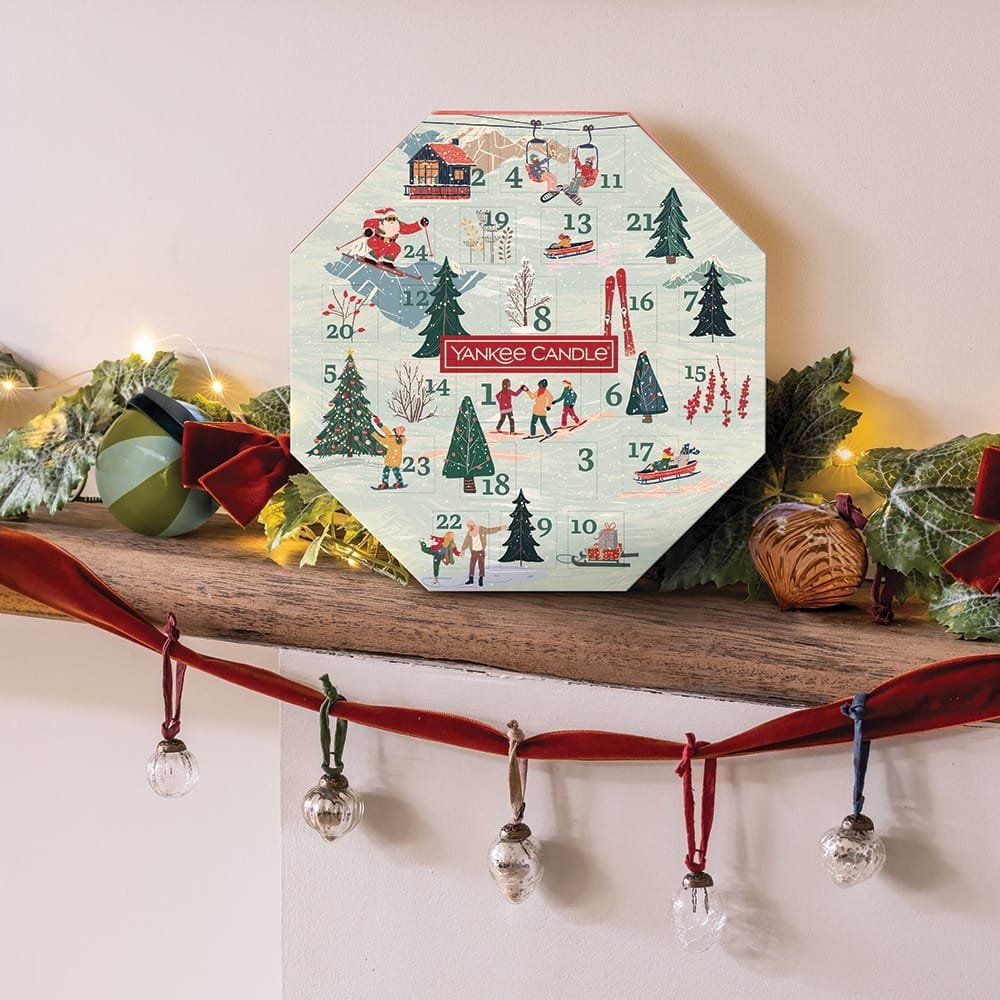 Yankee Candle adventskalender, achthoekig. 24 vakjes met winterlandschap. Opschrift: Yankee Candle.