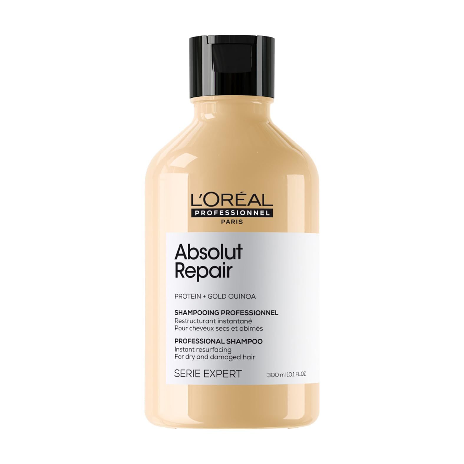 Beige shampoo fles met zwarte dop. Opschrift: L'Oréal Professionnel, Absolut Repair, Serie Expert.