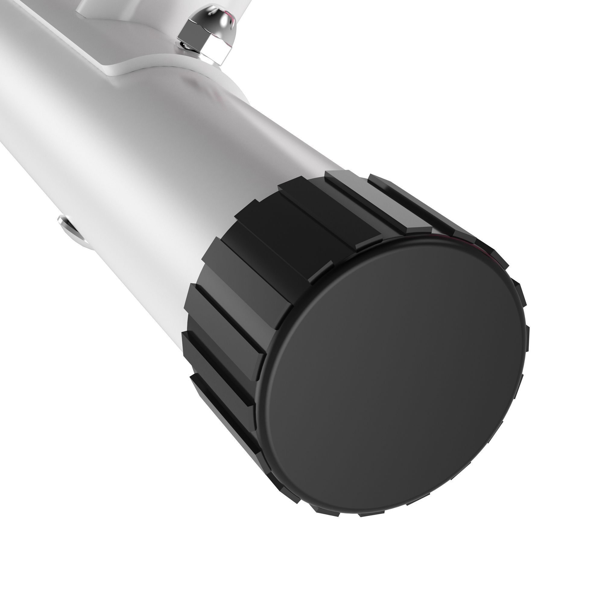 Close-up van de zwarte, gegroefde voet van een hometrainer. Ronde vorm met zwarte rubberen buffer.