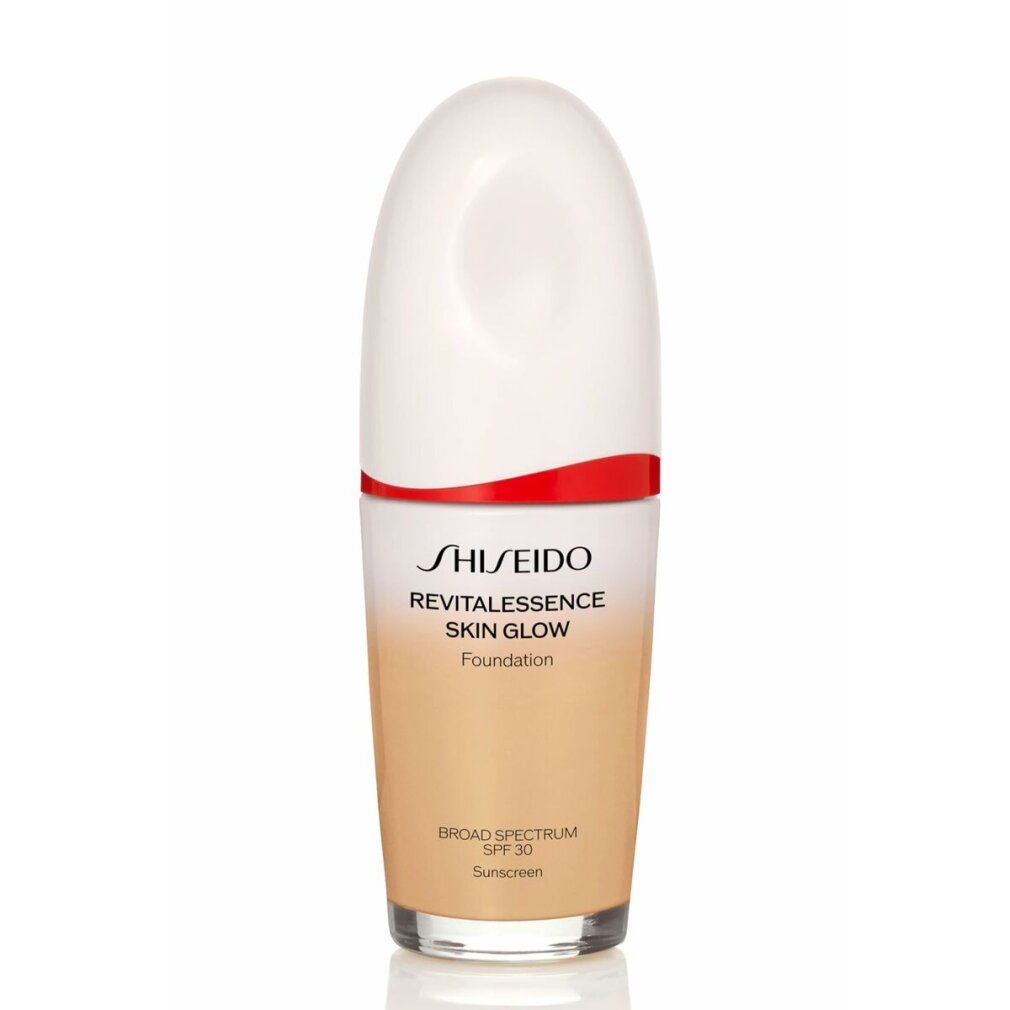 Shiseido Revitalessence Skin Glow Foundation. Fles met witte dop, rode accenten en kleurovergang. Productnaam en SPF 30 op de fles.