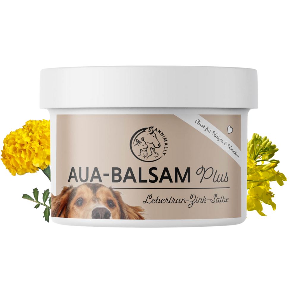 Pot blanc AUA-BALSAM Plus. Contient une pommade au foie de morue et au zinc. Avec chien et fleurs.