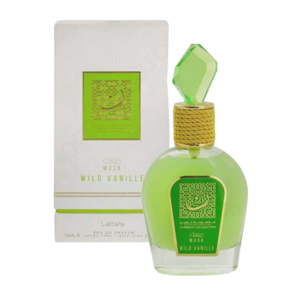 Groene parfumfles met gouden dop en groene kristallen punt. Witte verpakking met groen logo en tekst.