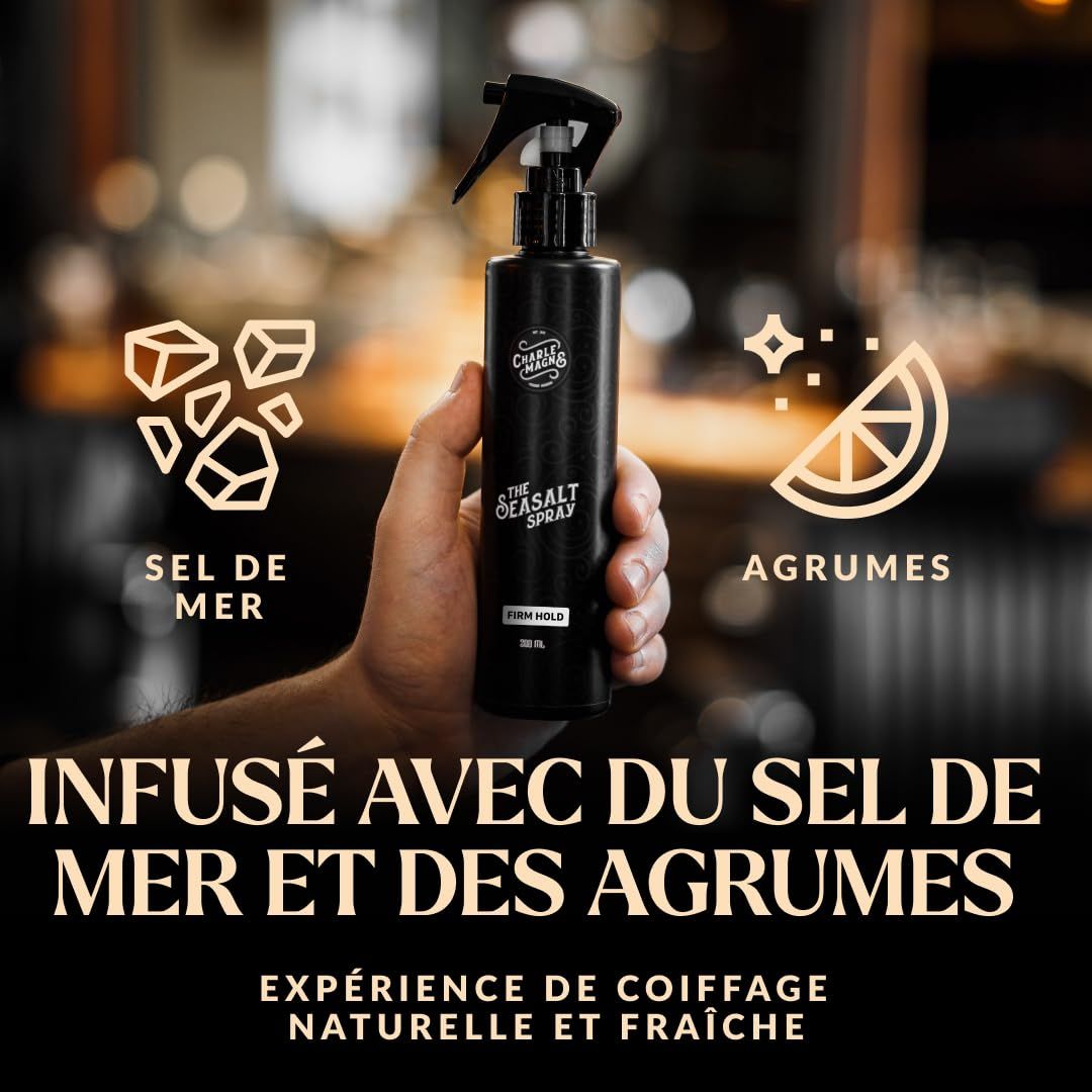 Flacon pulvérisateur noir "The Sea Salt Spray" avec symboles de sel marin et d'agrumes.