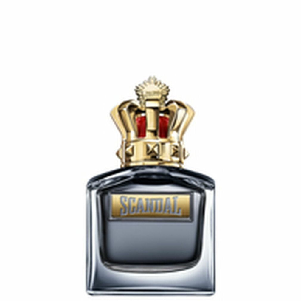 Flacon de parfum avec couronne dorée. Inscription "SCANDAL".