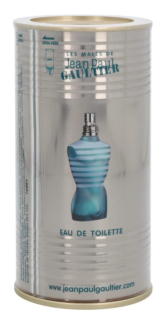 Boîte cylindrique avec flacon en forme de torse. Boîte avec logo "Jean Paul Gaultier Le Male". Flacon rayé bleu et blanc.