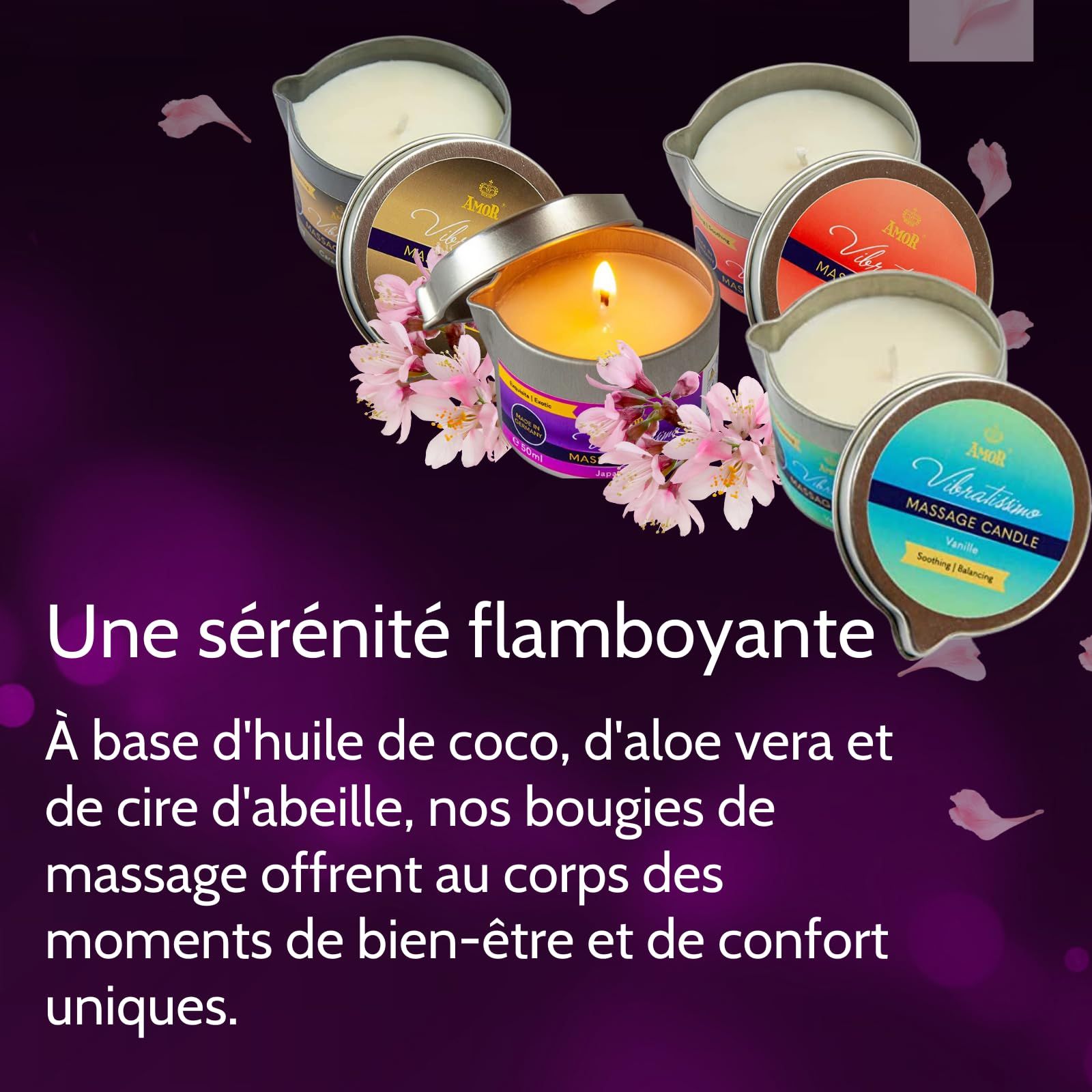 Plusieurs bougies de massage Vibratissimo en boîtes, une allumée, décorées de fleurs.