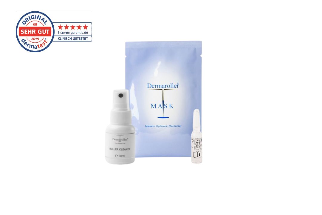 Spray Roller Cleaner, sachet de masque Dermaroller et une ampoule d'acide hyaluronique sur fond blanc.