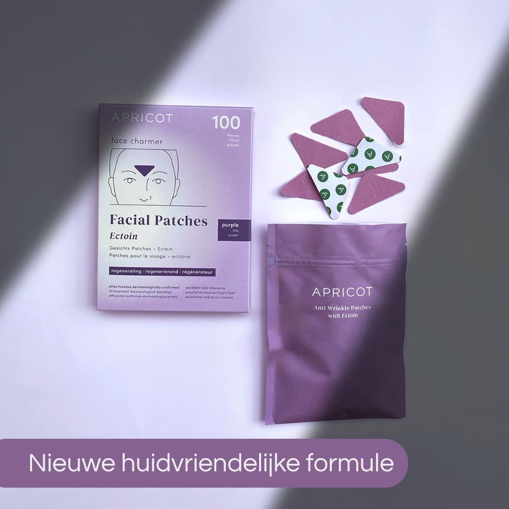 Verpakking met 100 gezichtspatches, zakje en losse patches. Tekst: APRICOT, Facial Patches, Ectoin.