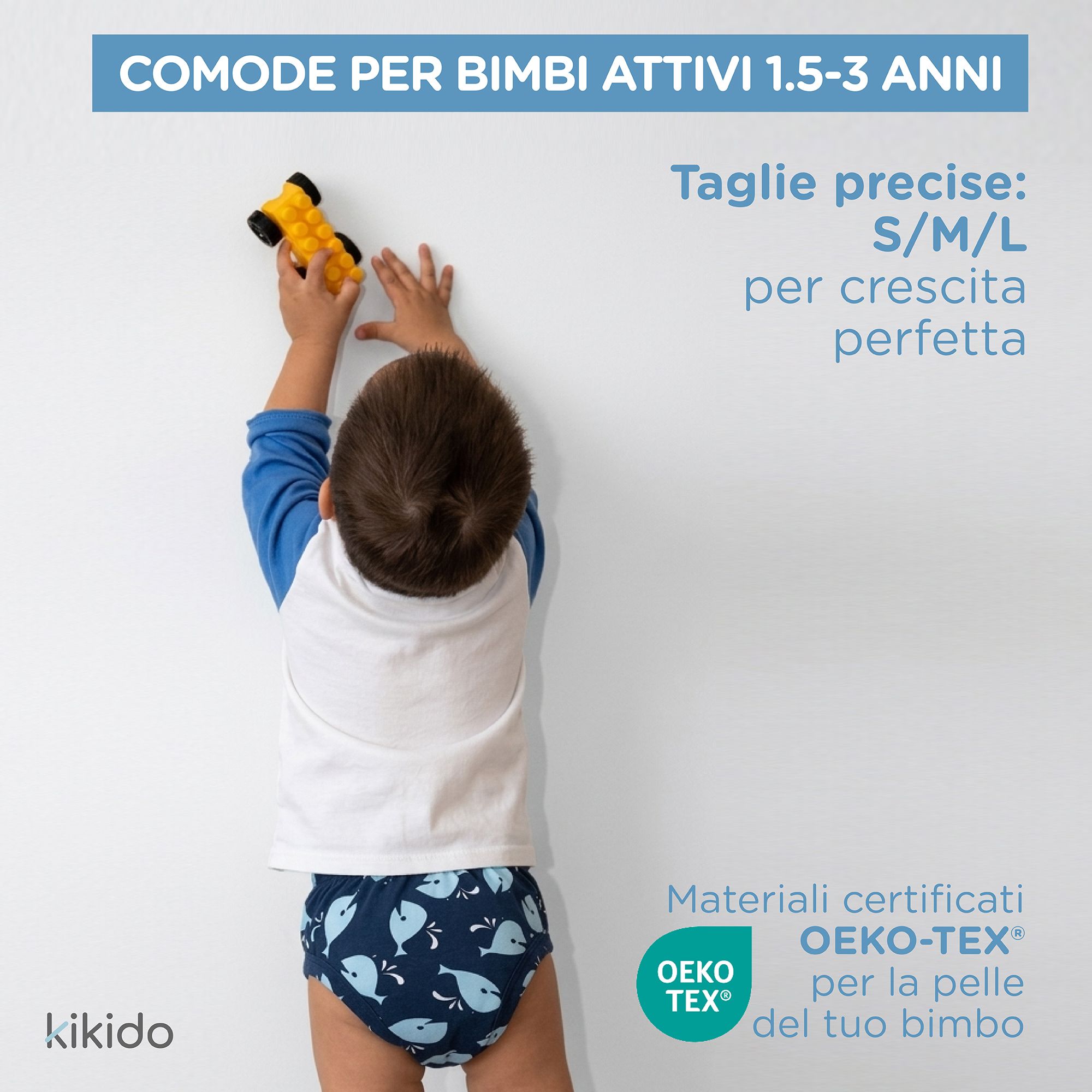 Culotte d'apprentissage bleue avec motifs baleines. Tailles S/M/L. Matériaux certifiés OEKO-TEX®. Marque : Kikido.