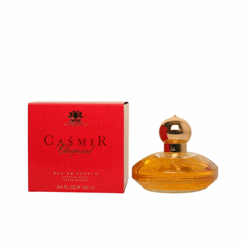 Geel parfumflesje met gouden dop en rode verpakking. Opschrift: Casmir Chopard.