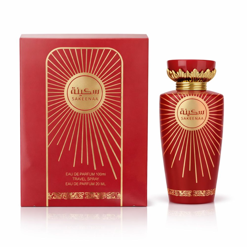 Rode parfumfles en doos. Gouden versieringen en belettering. Opschrift: Sakeenaa. Eau de Parfum.