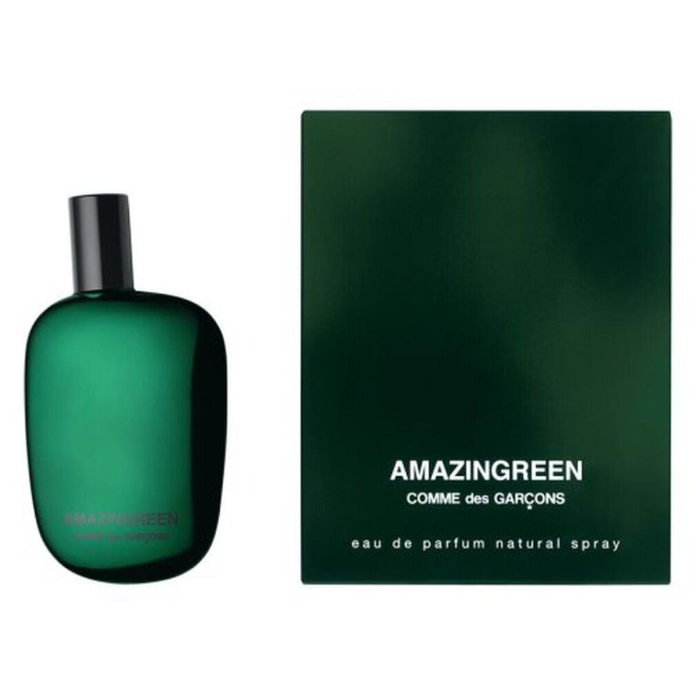 Groene parfumfles en groene doos. Opschrift: AMAZINGREEN, COMME des GARÇONS, eau de parfum natural spray.
