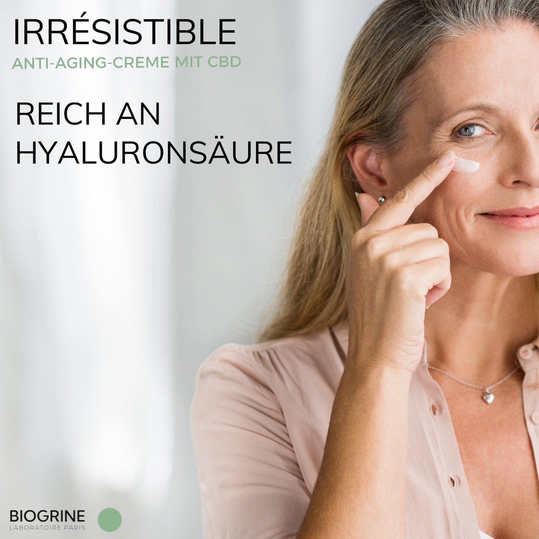 Vrouw brengt crème aan. Tekst: „IRRESISTIBLE“ anti-aging crème met CBD. Rijk aan hyaluronzuur. BIOGRINE.