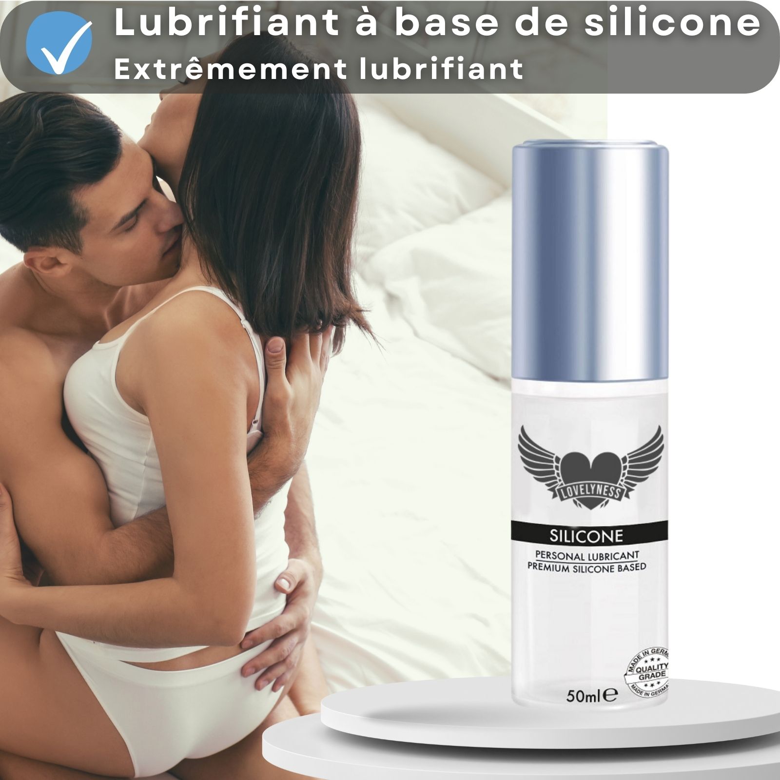 Flacon de lubrifiant silicone avec bouchon argenté. Texte: SILICONE. Femme avec fleur. Texte: Pour peaux sensibles.