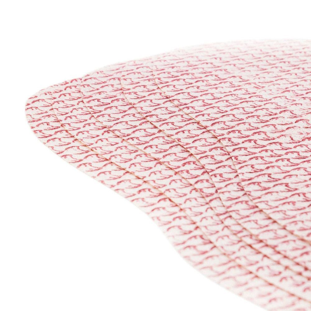 Gros plan de patchs amincissants. Rose avec motif rouge. Plusieurs superposés.