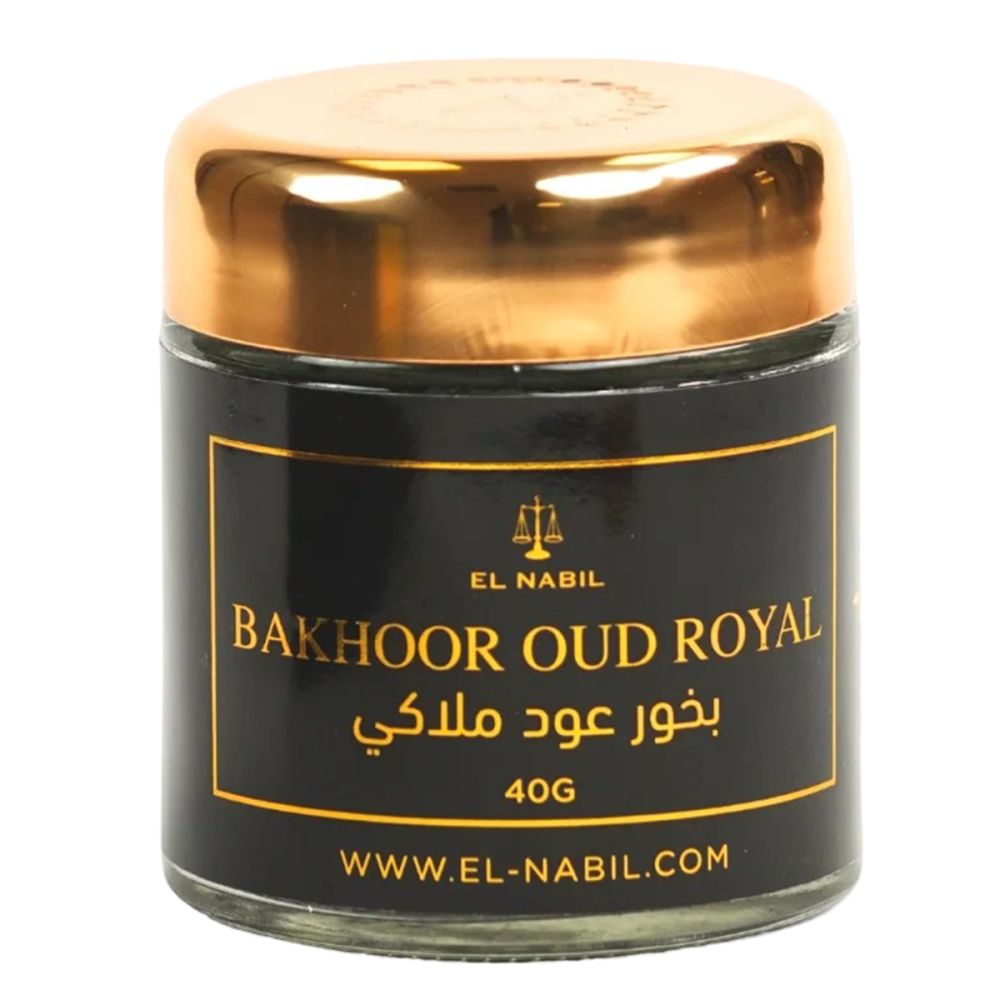 Pot en verre avec couvercle doré. Étiquette noire avec texte doré: BAKHOOR OUD ROYAL, écriture arabe, 40G, www.el-nabil.com.