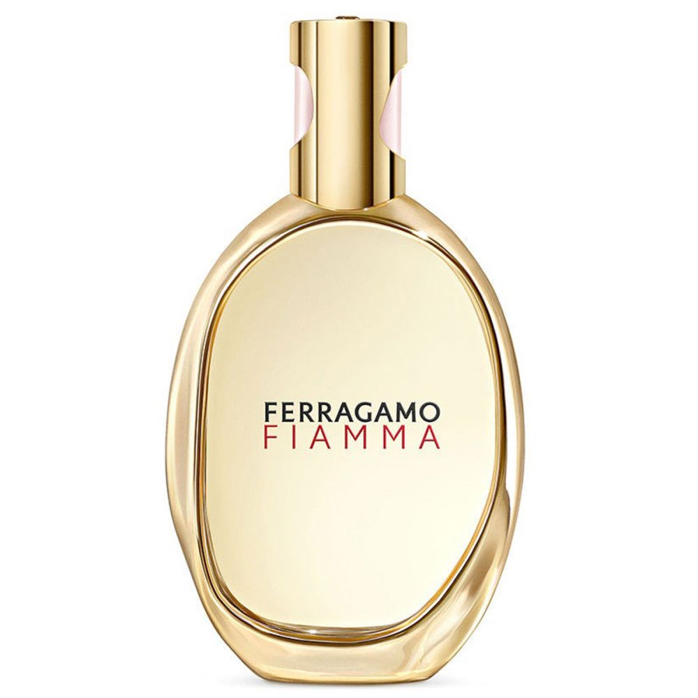 Flacon doré. Sur le flacon, "FERRAGAMO FIAMMA". Le flacon a un bouchon doré.