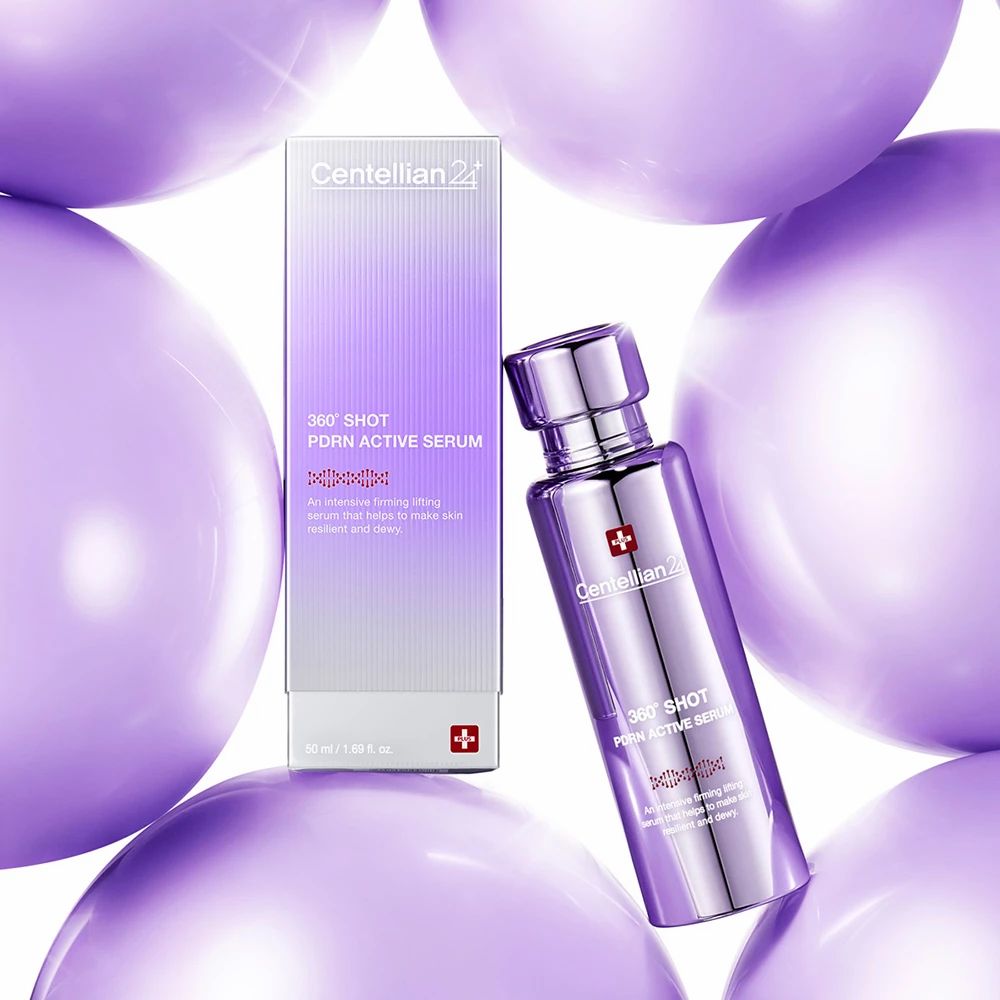 Flacon et emballage entourés de ballons violets. Inscriptions: CENTELLIAN24, 360° SHOT PDRN ACTIVE SERUM.