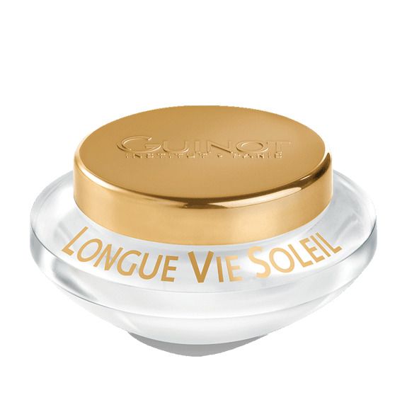 Crèmepot met gouden deksel. "GUINOT" op deksel. "LONGUE VIE SOLEIL" op pot.