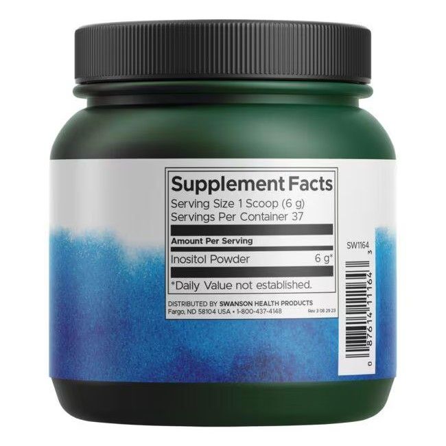 Achterkant van de groene supplementpot. Bevat voedingsinformatie voor Inositol Powder. Zwarte deksel, blauw en wit etiket.