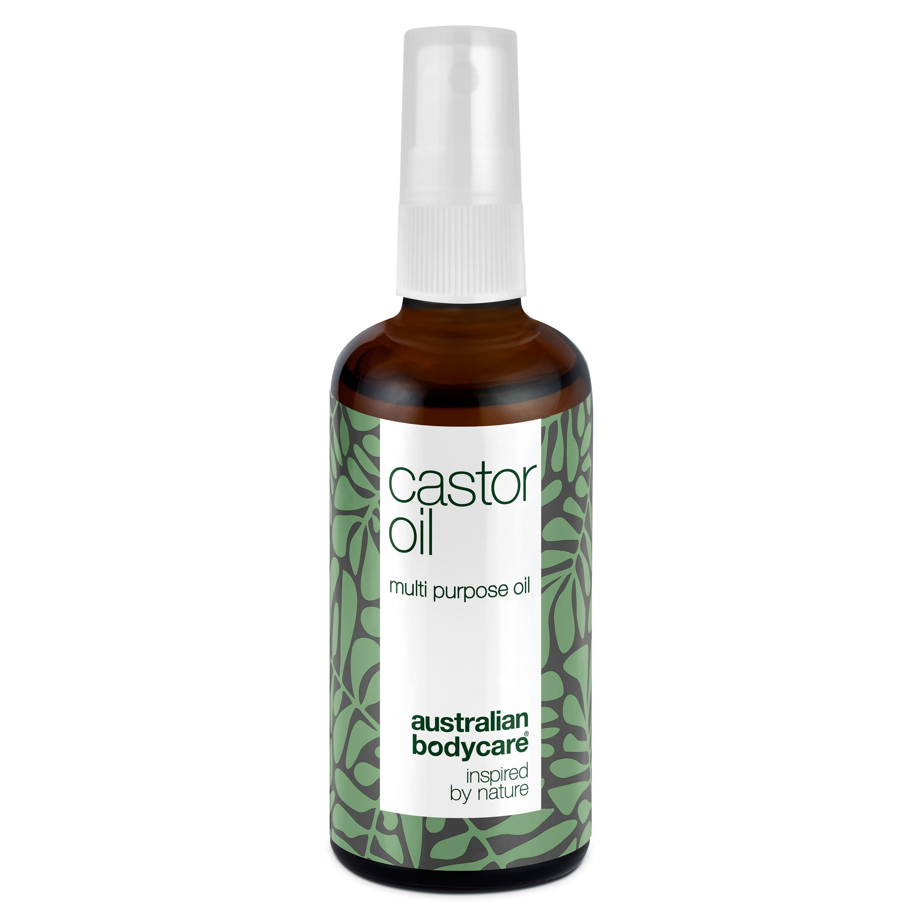 Flacon en verre brun avec vaporisateur. Étiquette "castor oil" et "australian bodycare".