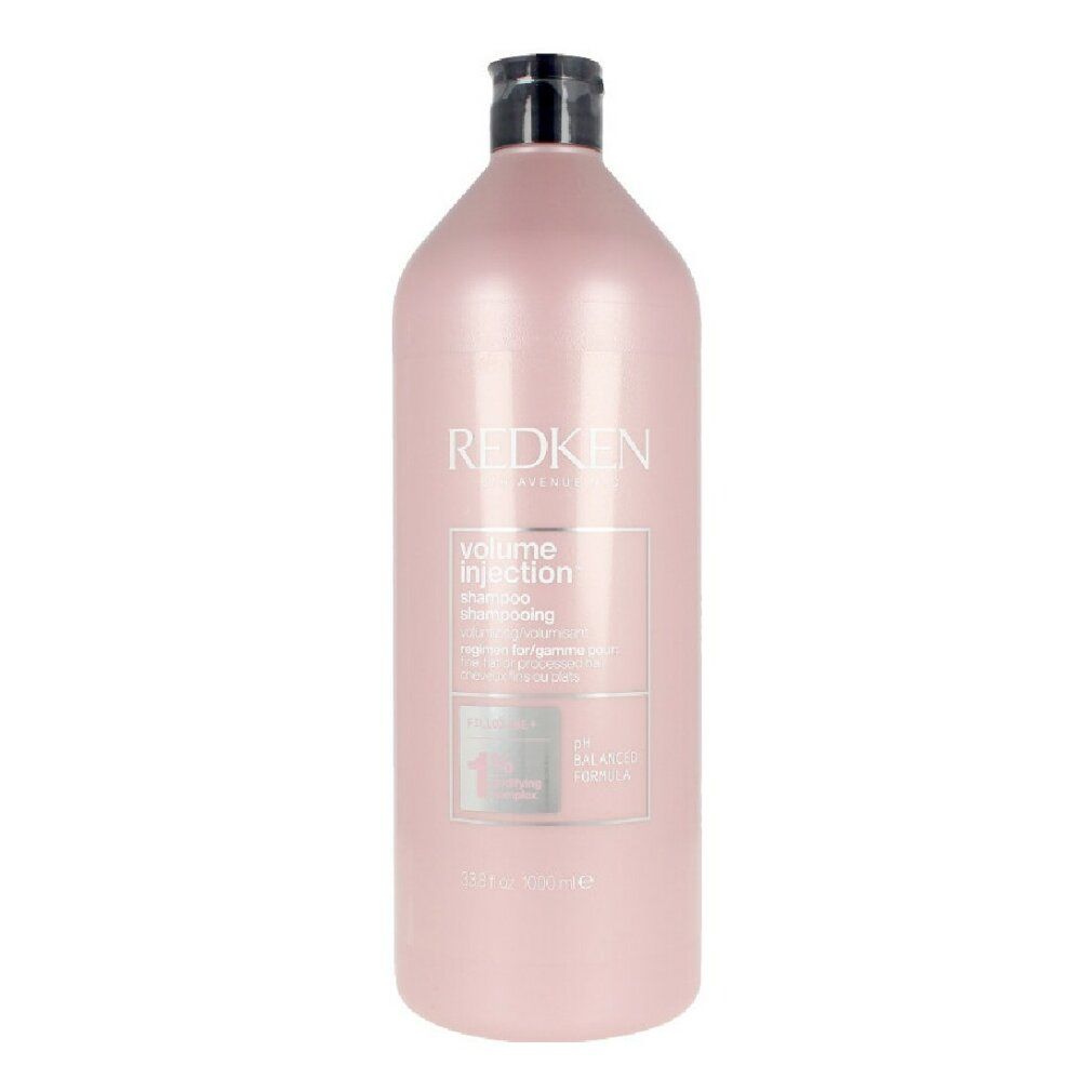 Shampoing Redken Volume Injection dans une bouteille rose de 1000ml avec un bouchon noir.