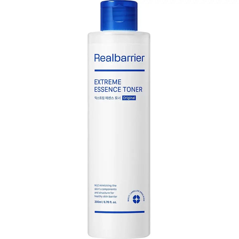 Flacon blanc avec bouchon bleu. Nom du produit et texte clairement visibles. Inscription : Extreme Essence Toner.