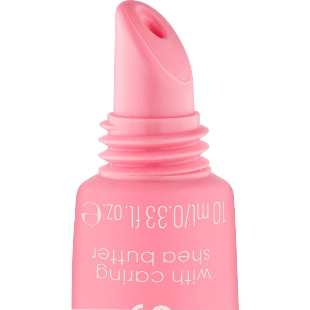 Gros plan de l'embout d'un tube rose. Texte "10 ml/0.33 fl.oz." et "with caring shea butter".