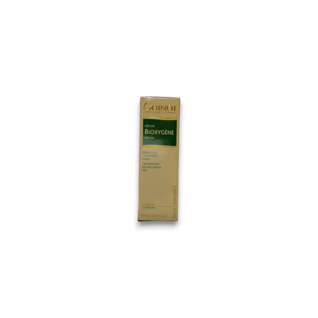 Kartonnen verpakking met productnaam en logo. Beige kleur, groen etiket. Guinot-logo. "Sérum Bioxygène".