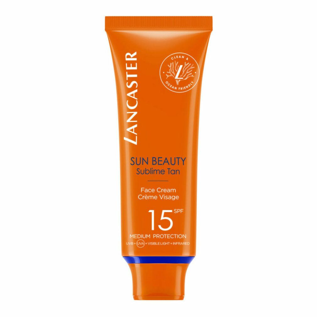 Tube orange avec texte blanc. Lancaster Sun Beauty, SPF 15. Crème visage. Ocean Friendly.
