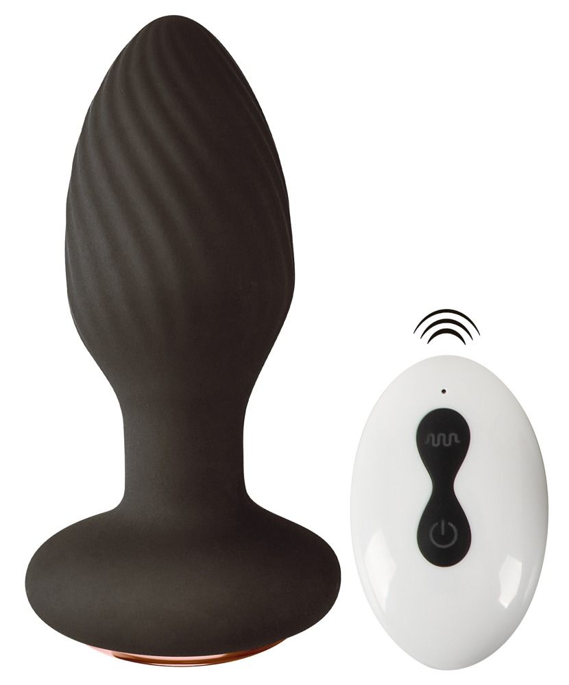 Plug anal noir à texture spirale et télécommande.