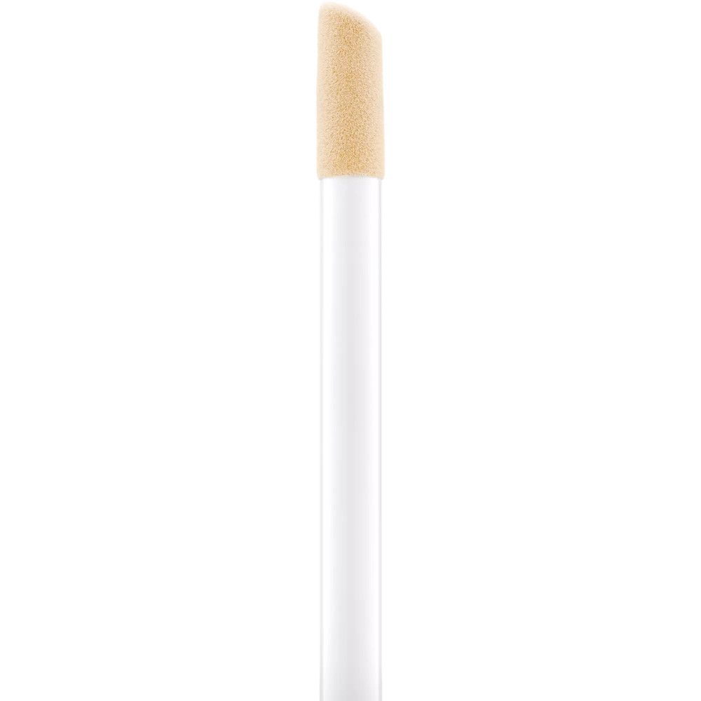 Tige applicateur blanche avec embout éponge biseauté beige.