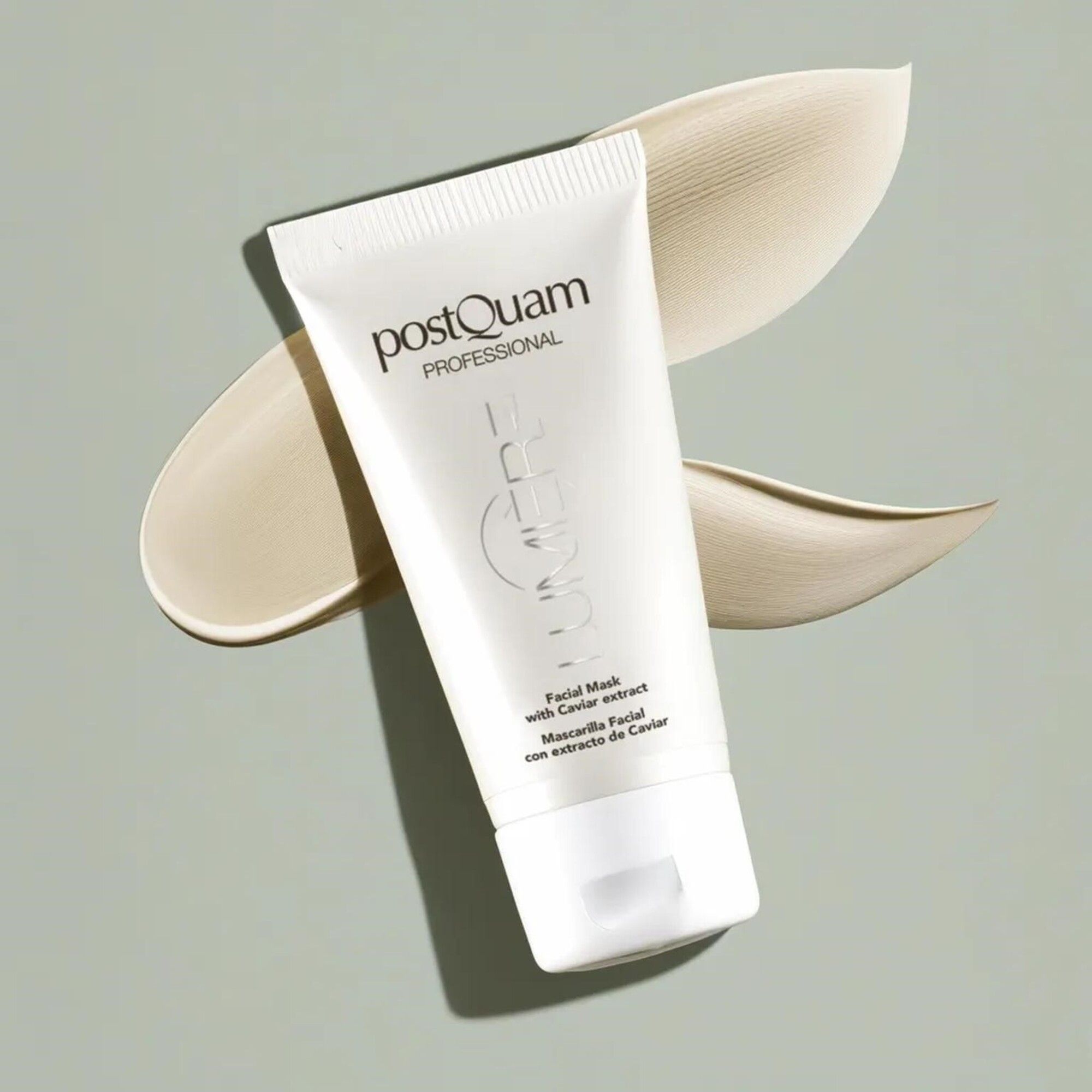 Witte tube op lichte achtergrond met crèmekleurig product. Opschrift: Postquam Professional, Lumière, Facial Mask with Caviar extract.