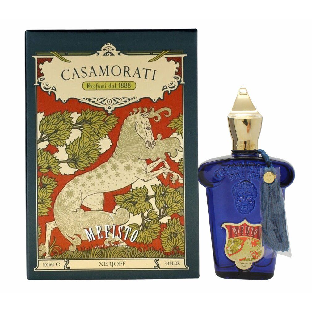 Flacon bleu avec bouchon doré et pompon. Inscription Mefisto et Casamorati. Emballage vert avec illustration de cheval.